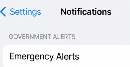 An iPhone Notifications settings detail showing the Government Alerts heading and Emergency Alerts label.
